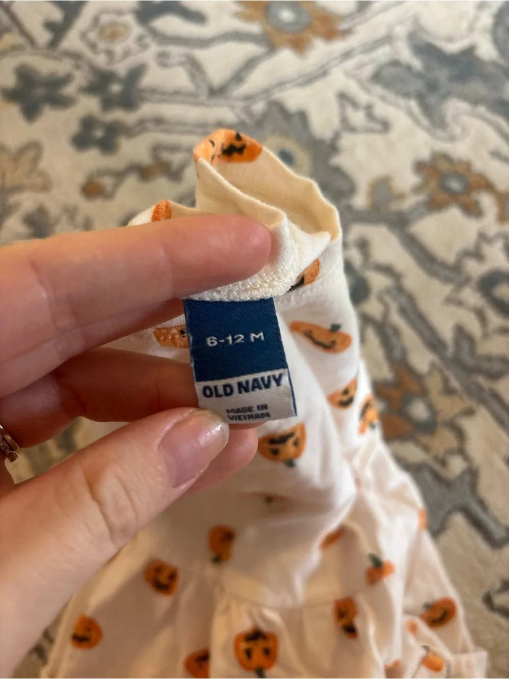 White Long-Sleeve Ruffled Top with Orange Pumpkin Print